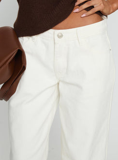 side view of model wearing Princess Polly Ramos Low Rise Wide Leg Jeans White Low Rise Jeans 
