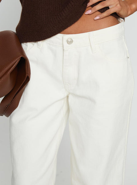 side view of model wearing Princess Polly Ramos Low Rise Wide Leg Jeans White Low Rise Jeans 