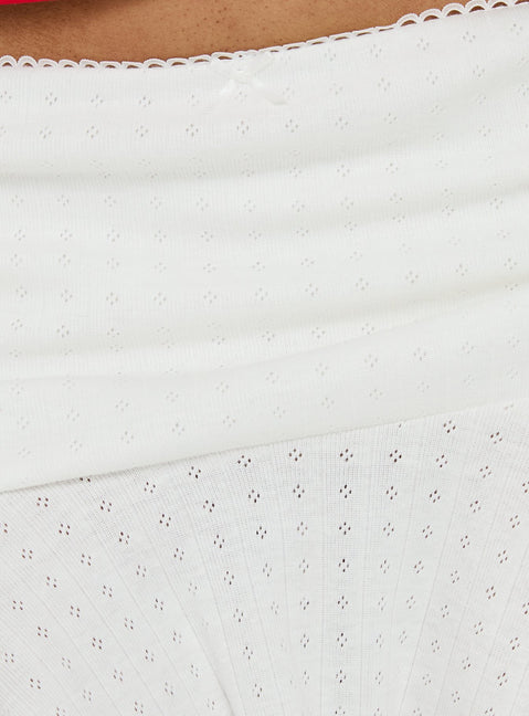 Highlighting the Elidia Pointelle Ruffle Mini Skirt in white womens-skirts with mini length product