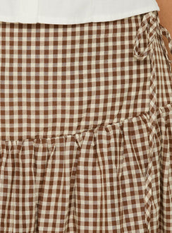 Showcasing the Kasida Tie Detail Midi Skirt Brown Check in womens-skirts with midi length on-body view of model wearing Princess Polly