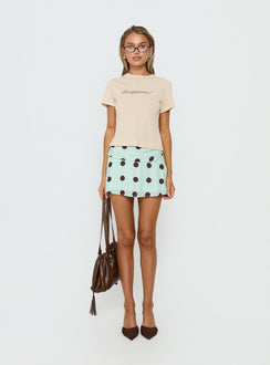   side view of model wearing Princess Polly Elicia Ruched Mini Skirt Mint / Chocolate Polka Dot Mini Skirts 