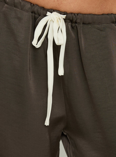 Highlighting the Dialled Up Tie Waist Satin Pants Mocha in womens regular pants with mid-rise and belt detail product view