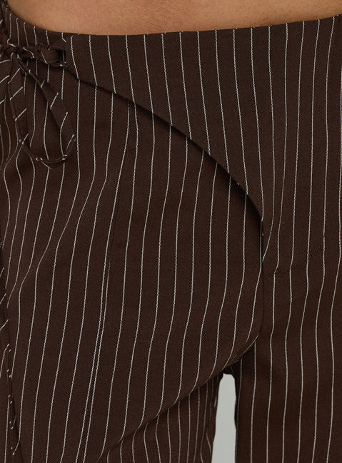 Designed with precision, the Editta Tie Detail Low Rise Tailored Pants Brown Pinstripe in womens-regular-pants with low-rise detail view of model wearing