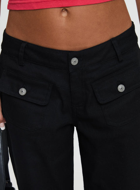 back view of model wearing Princess Polly Benicale Low Rise Cargo Pants Black Low Rise Pants 