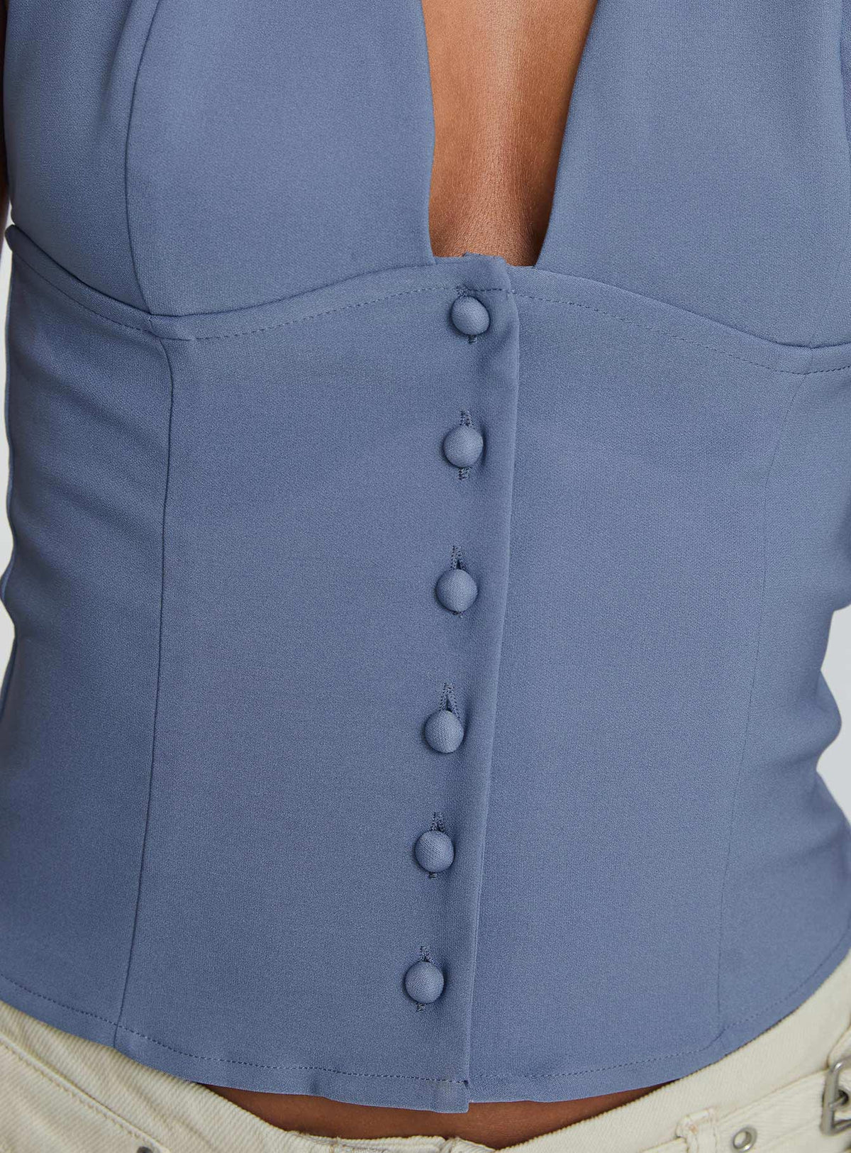 back view of model wearing Princess Polly Serefina Halter Top Blue Slate Sleeveless Plunger 