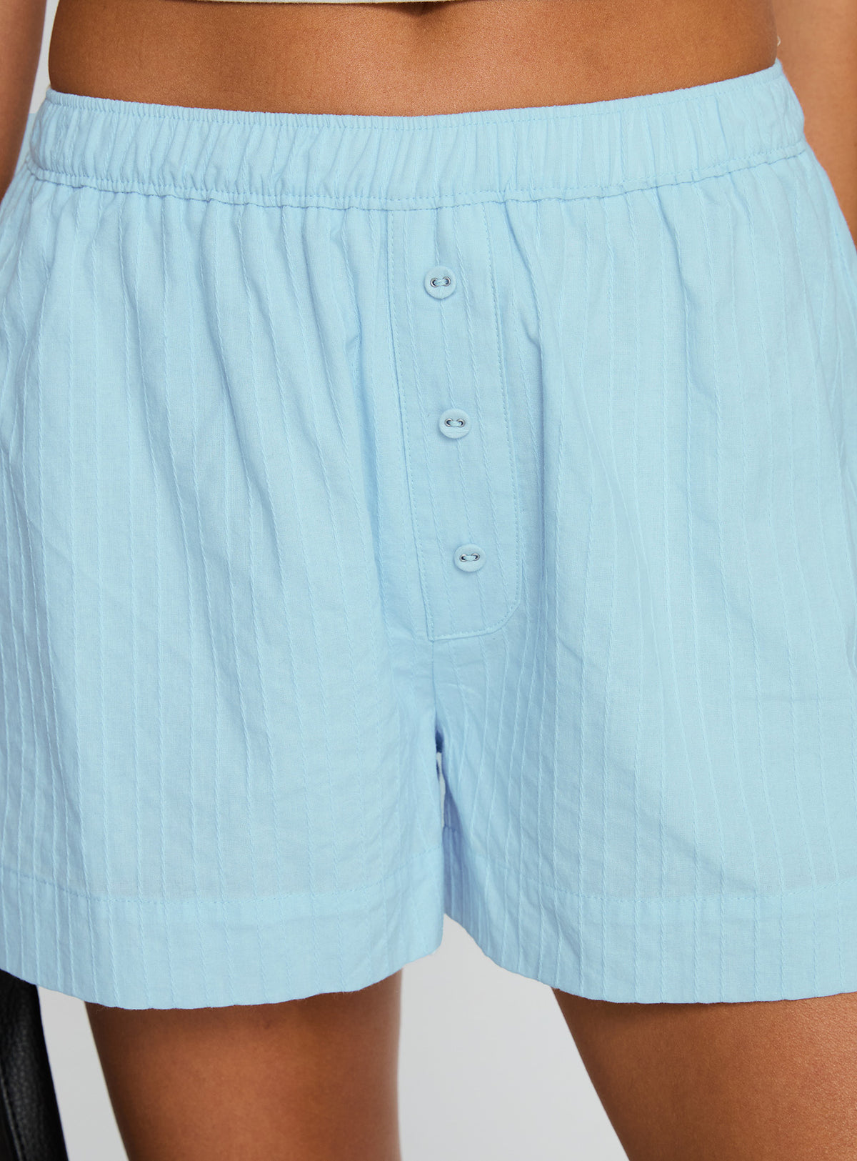 back view of model wearing Princess Polly Addee Boxer Short Aqua High Waisted Shorts 