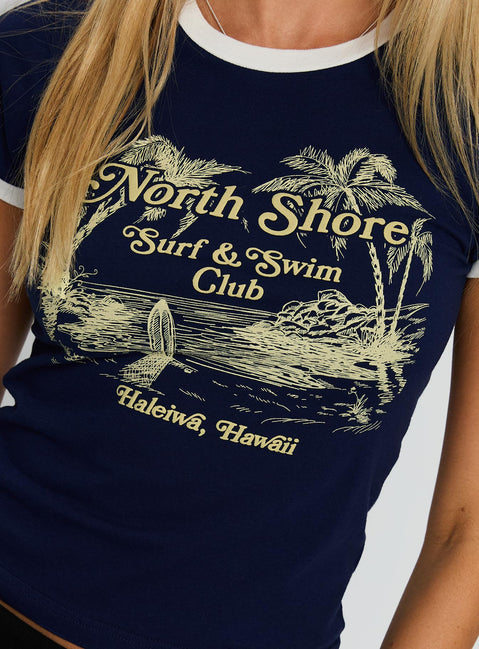 back view of model wearing Princess Polly North Shore Graphic Top Blue Short Sleeves Crew Neck 