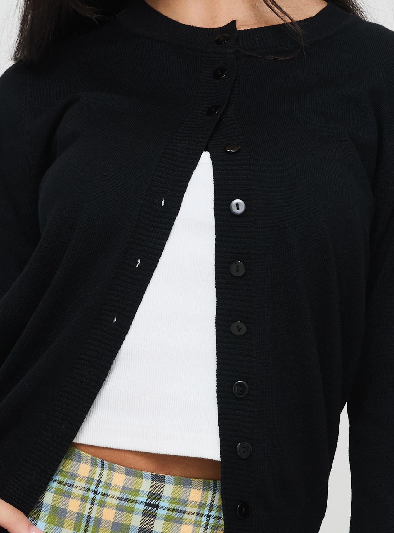 front view of model wearing Princess Polly Capeside Knit Cardigan Black Cropped 