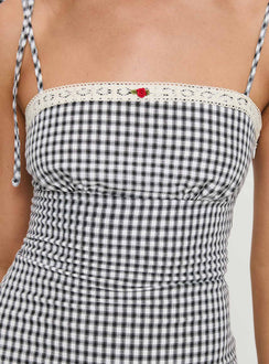 back view of model wearing Princess Polly Burkes Mini Dress Black Check Square Neck 