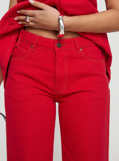back view of model wearing Princess Polly Top Model Jeans Red Mid Rise 