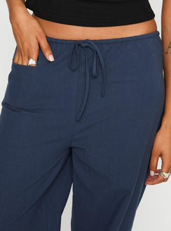 front view of model wearing Princess Polly Zodie Low Waist Pants Navy Low Rise Pants 