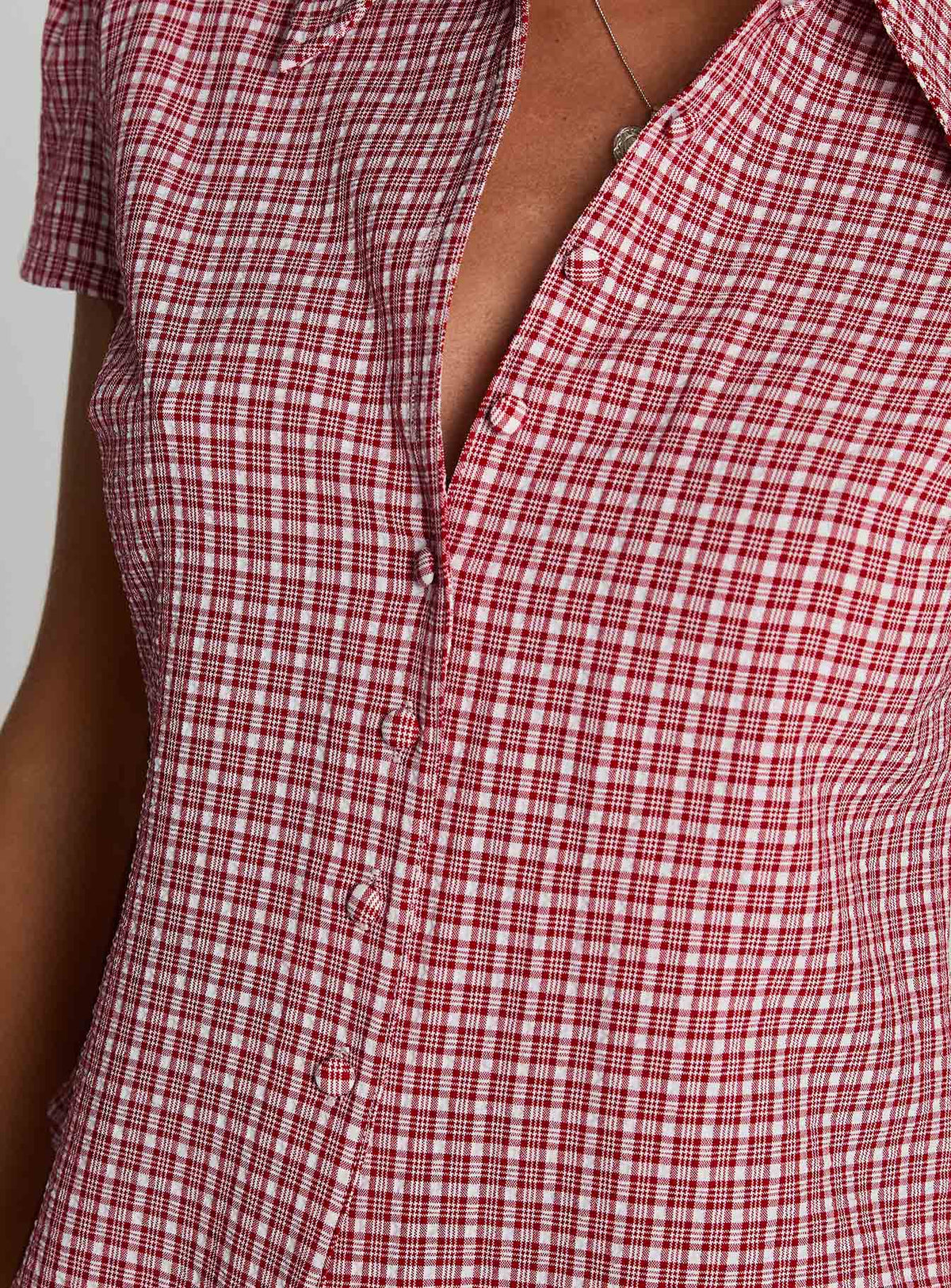 back view of model wearing Princess Polly Float Away Button Up Top Red Check Short Sleeves V-Neck 