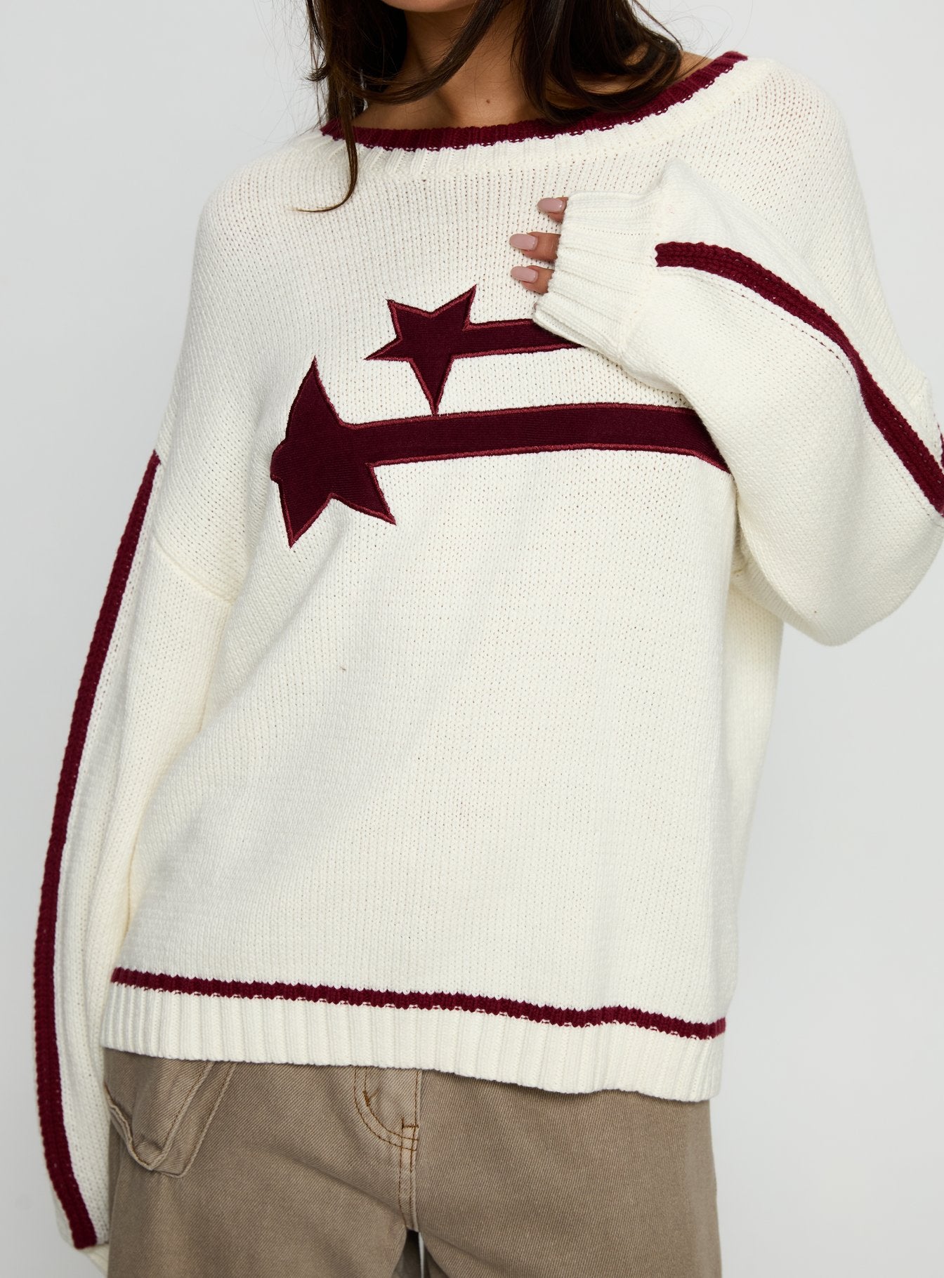front view of model wearing Princess Polly Star Track Graphic Jumper Cream / Red Longline Jumpers 