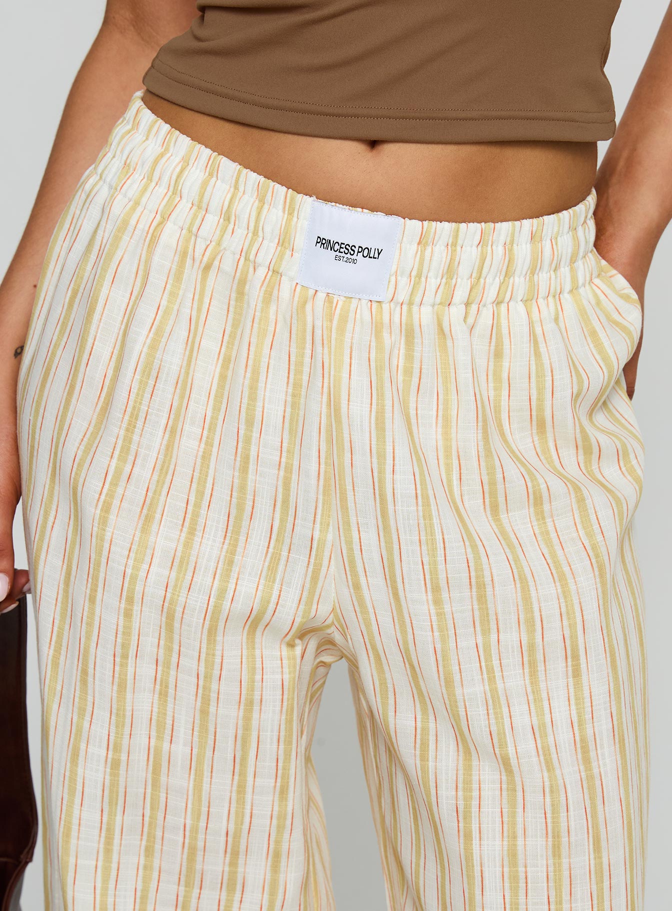 back view of model wearing Princess Polly Beach House Pants Yellow Stripe High Rise Pants Pants 