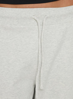Highlighting the Dojo 3/4 Track Pants Grey Marle in womens regular pants with mid-rise detail Princess Polly