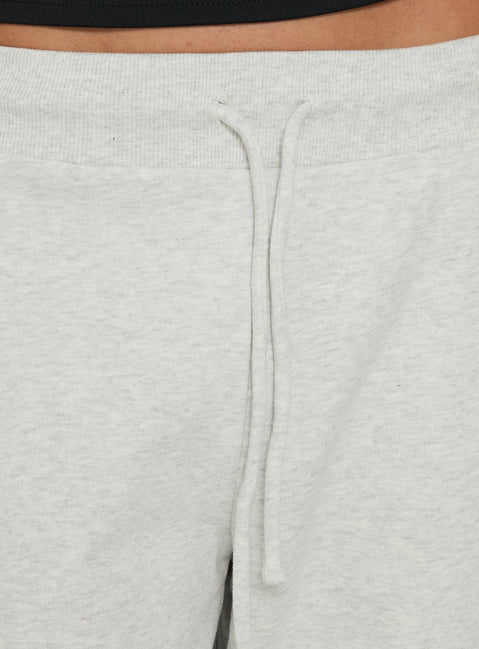 Highlighting the Dojo 3/4 Track Pants Grey Marle in womens regular pants with mid-rise detail Princess Polly