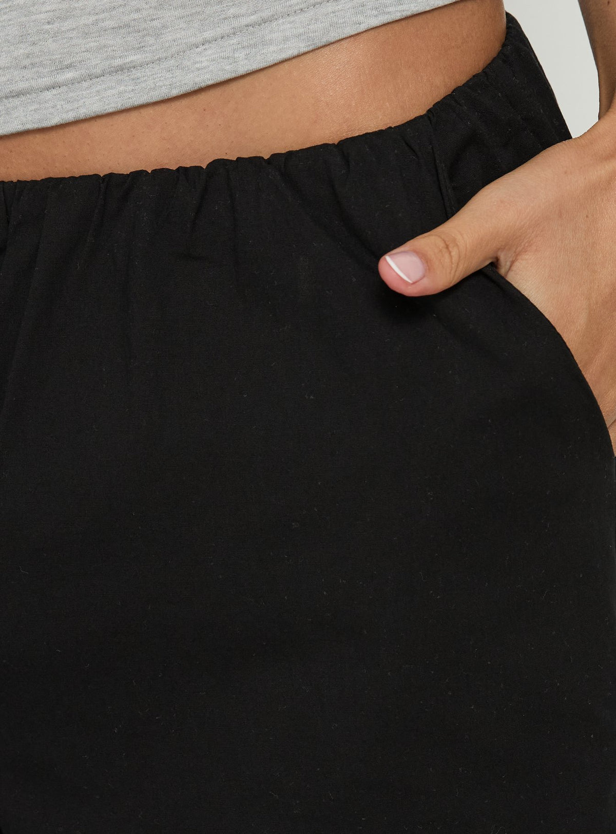Crafted with the Lunea Concealed Waistband 3/4 Pant Black in womens-regular-pants featuring mid-rise detail view of model wearing Princess Polly
