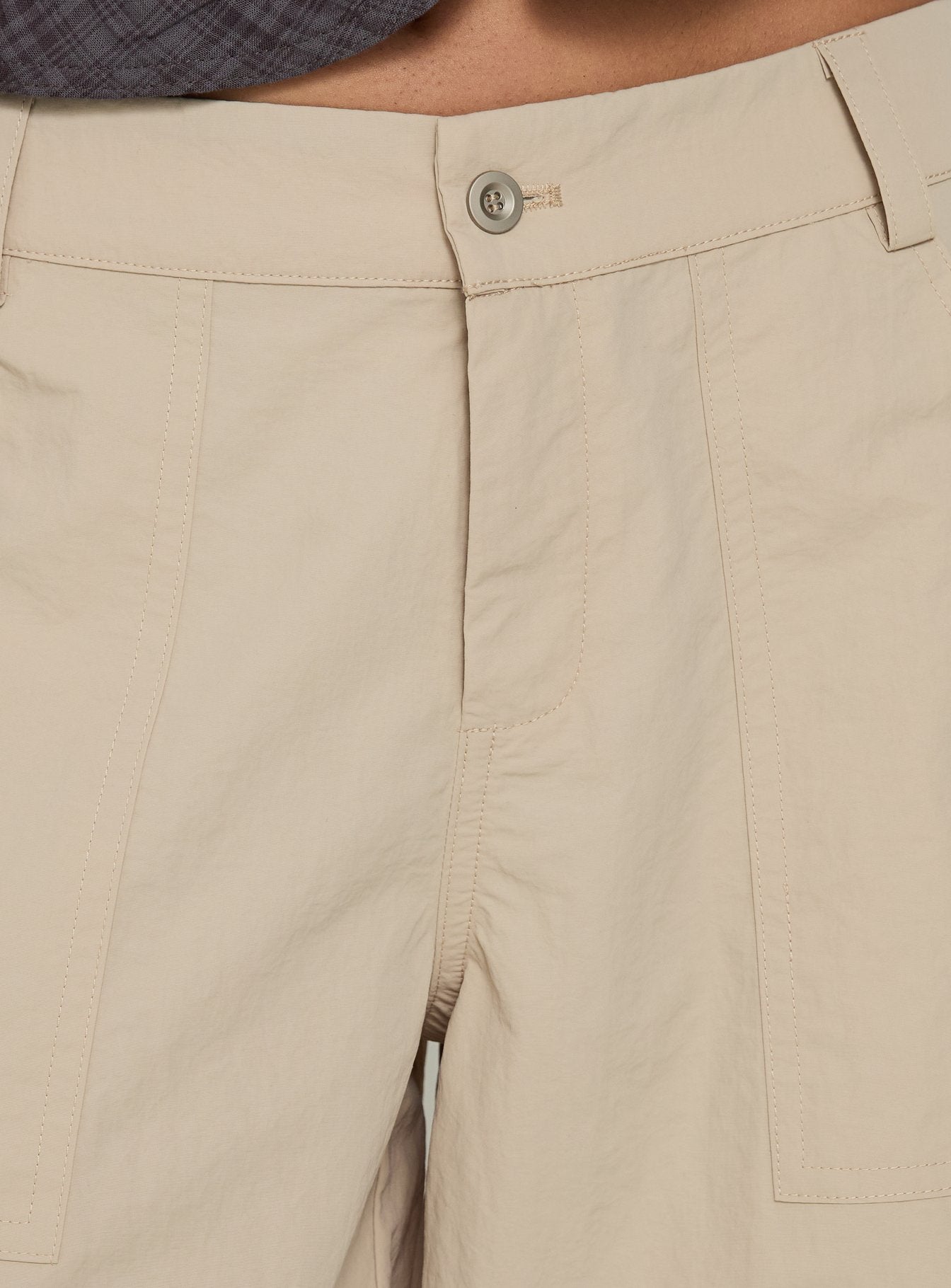 Highlighting the Relaxer 3/4 Cargo Pants Beige in womens regular pants with mid-rise waistband detail Princess Polly