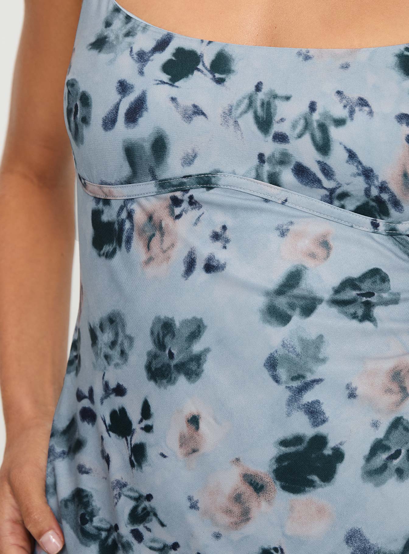 side view of model wearing Princess Polly Ravia Maxi Dress Blue / Floral Square Neck 