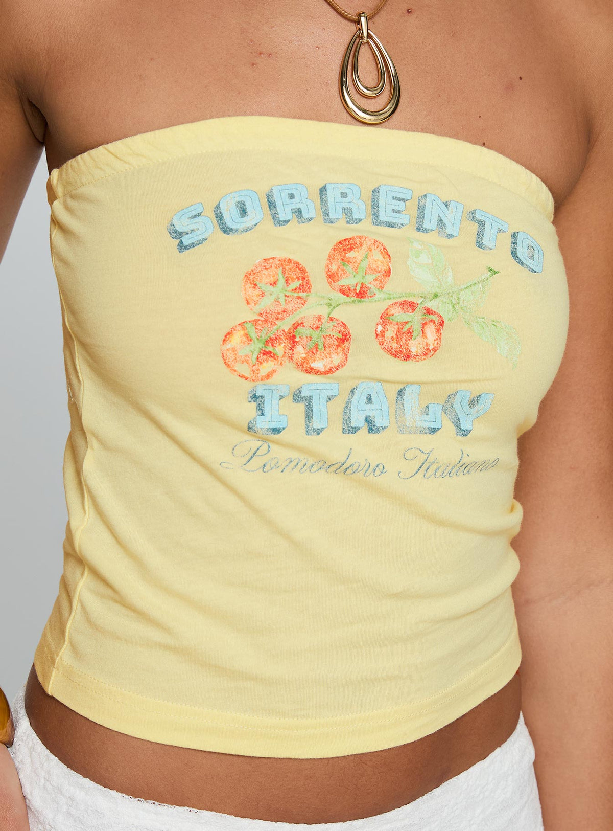 back view of model wearing Princess Polly Sorrento Italy Strapless Top Yellow Sleeveless straight 