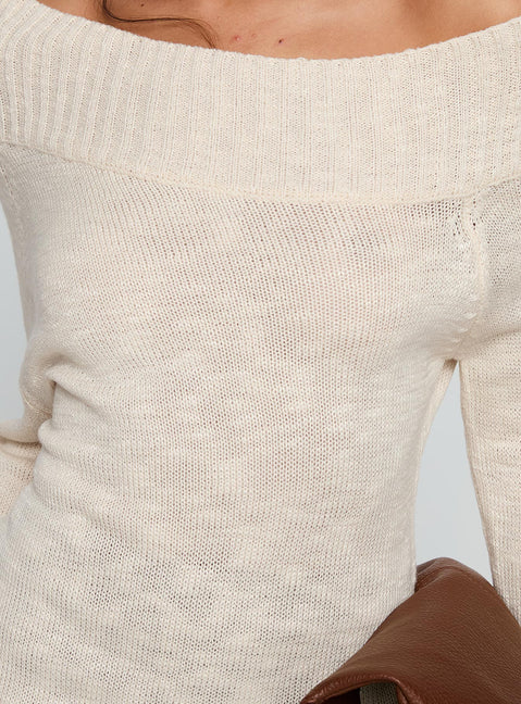 Featuring the Alyxandra Off Shoulder Knit Sweater in Beige, a long oversized womens jumper with boat neckline, detail view of model wearing Princess Polly