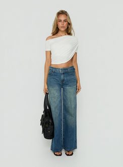 Showcasing Charlotta Low Rise Super Baggy Jeans Mid Blue womens-jeans front view of model wearing Princess Polly
