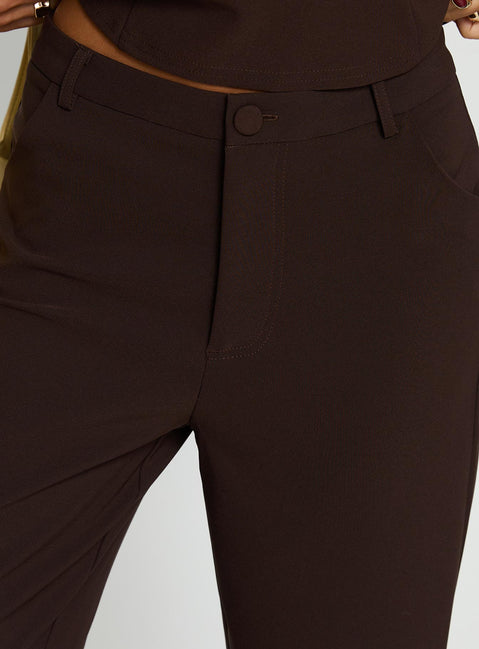 back view of model wearing Princess Polly Kinsie Tailored Pants Brown High Rise Pants 