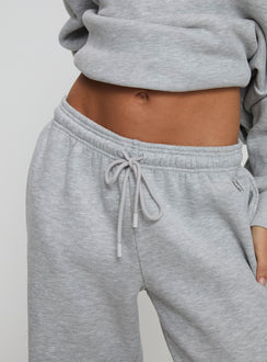 back view of model wearing Princess Polly Dream Fleece Ankle Cuff Sweatpants Grey Marle High Waisted Pants 