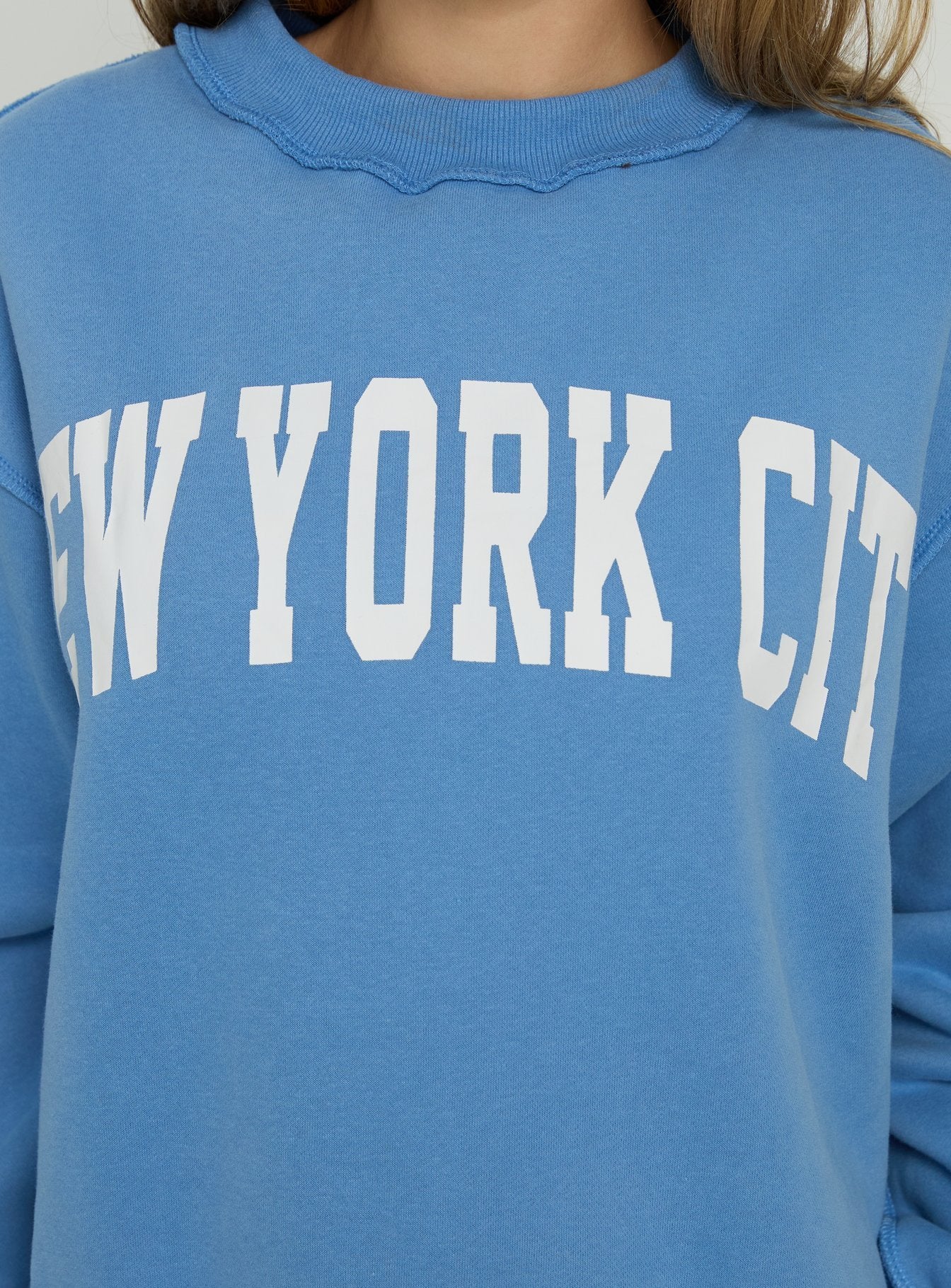 Featuring the When In New York City Oversized Jumper Blue womens jumper with long fit on-body Princess Polly