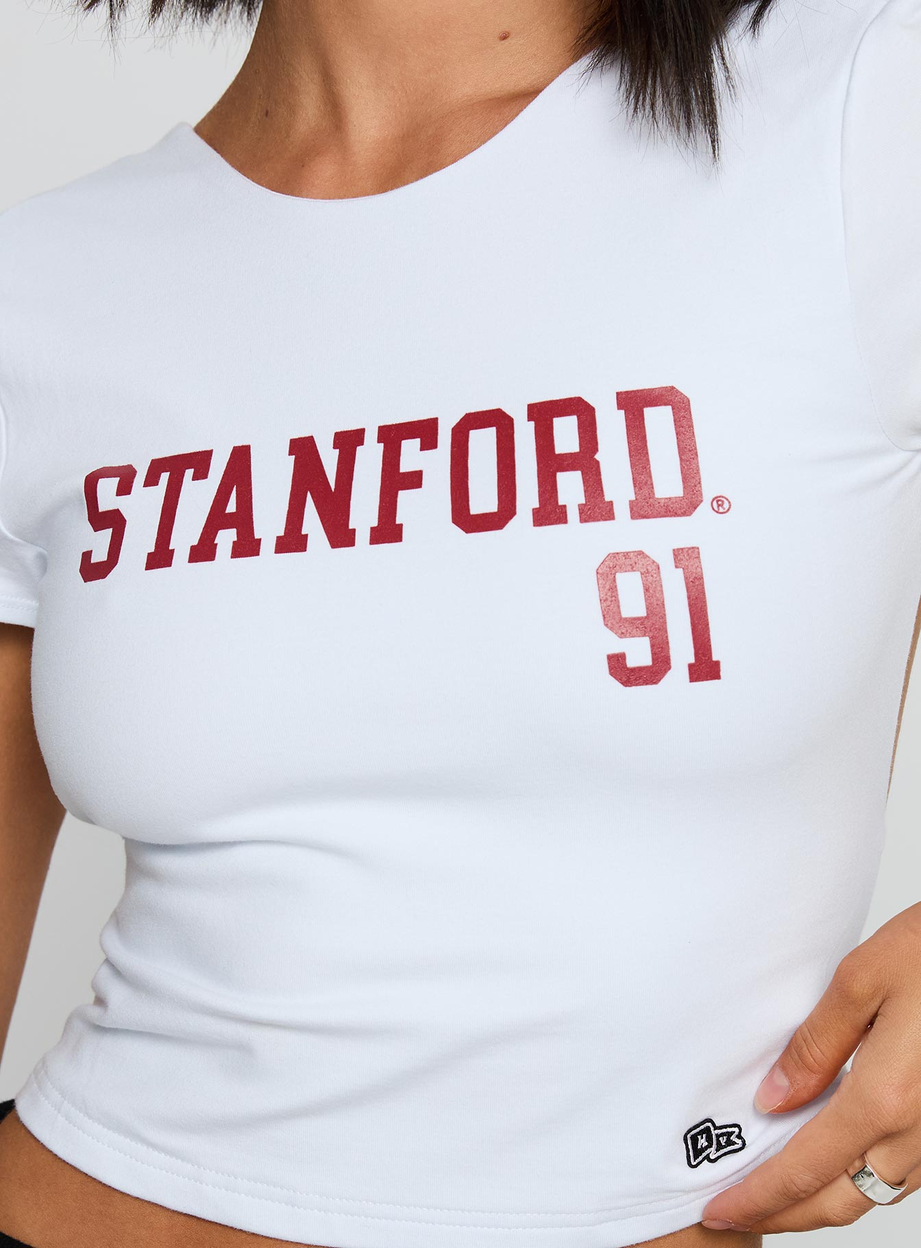back view of model wearing Princess Polly Stanford Comeback Top White Short Sleeves Crew Neck 
