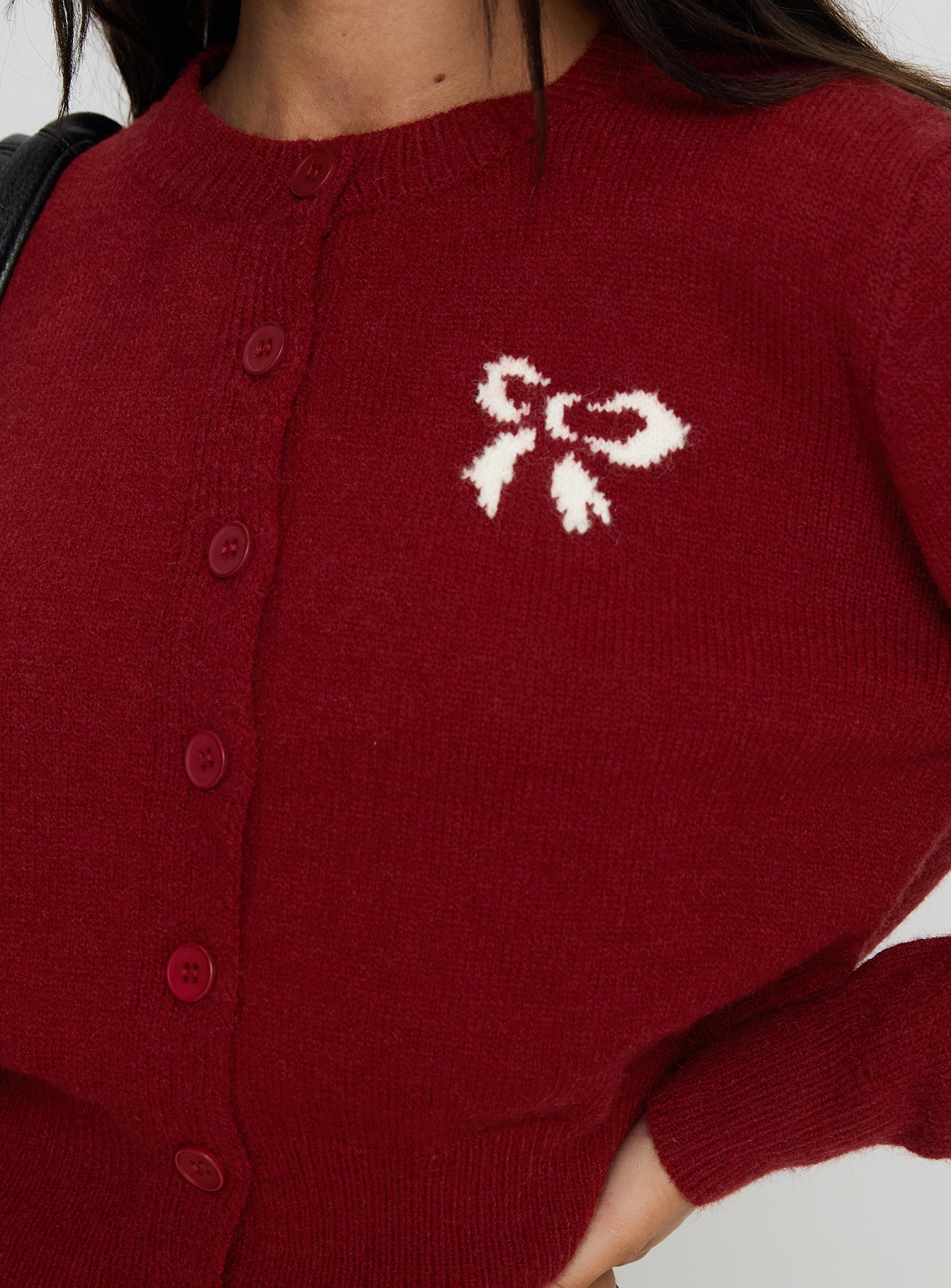 back view of model wearing Princess Polly With A Bow Cardigan Red 