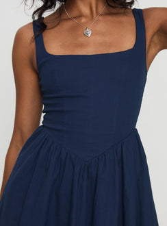 back view of model wearing Princess Polly Martie Mini Dress Navy Square Neck 