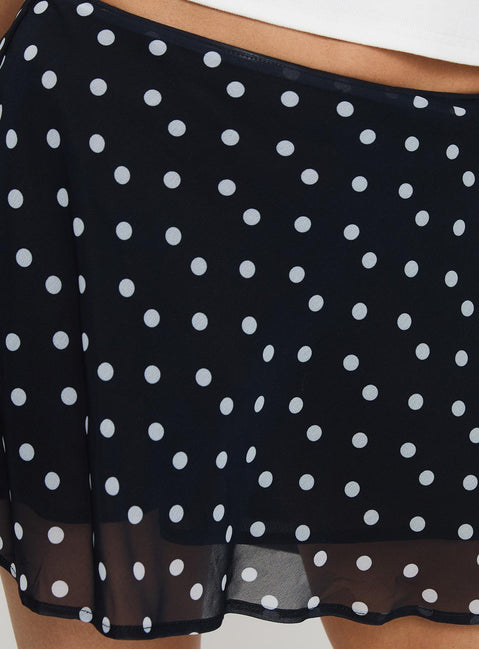 back view of model wearing Princess Polly Dapple Bias Mini Skirt Black Polka Dot Mini Skirts Skirts 