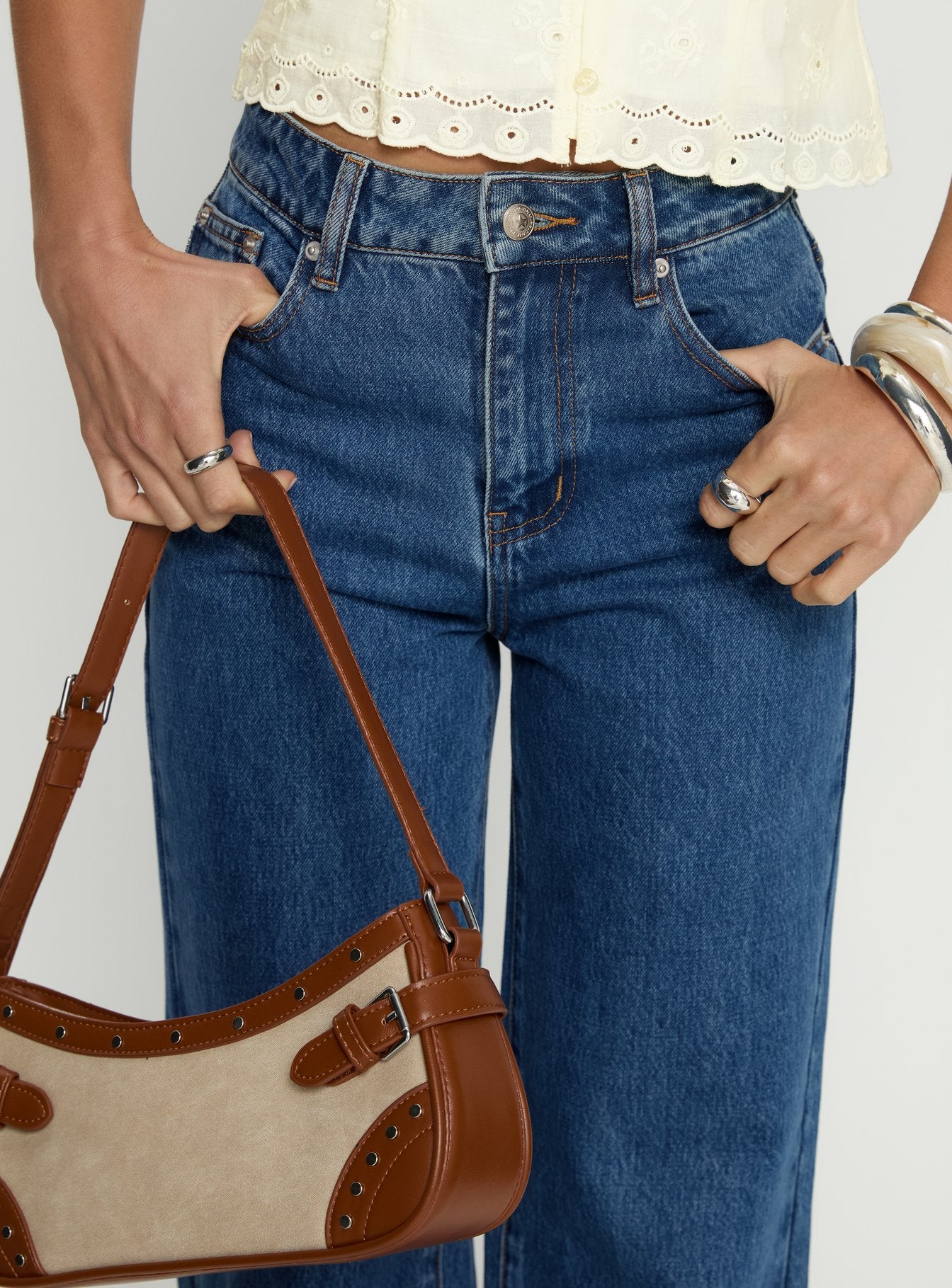 front view of model wearing Princess Polly Goldie High Rise Wide Leg Jeans Mid Blue Wash High Rise Jeans 