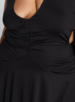 back view of model wearing Princess Polly Maeva Halter Mini Dress Black Curve Plunger 