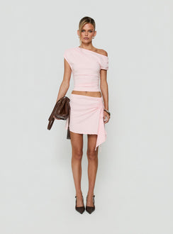 Showcasing the Vesperra Ruched Midi Skirt Pink womens-skirts in mini length front view of model wearing Princess Polly