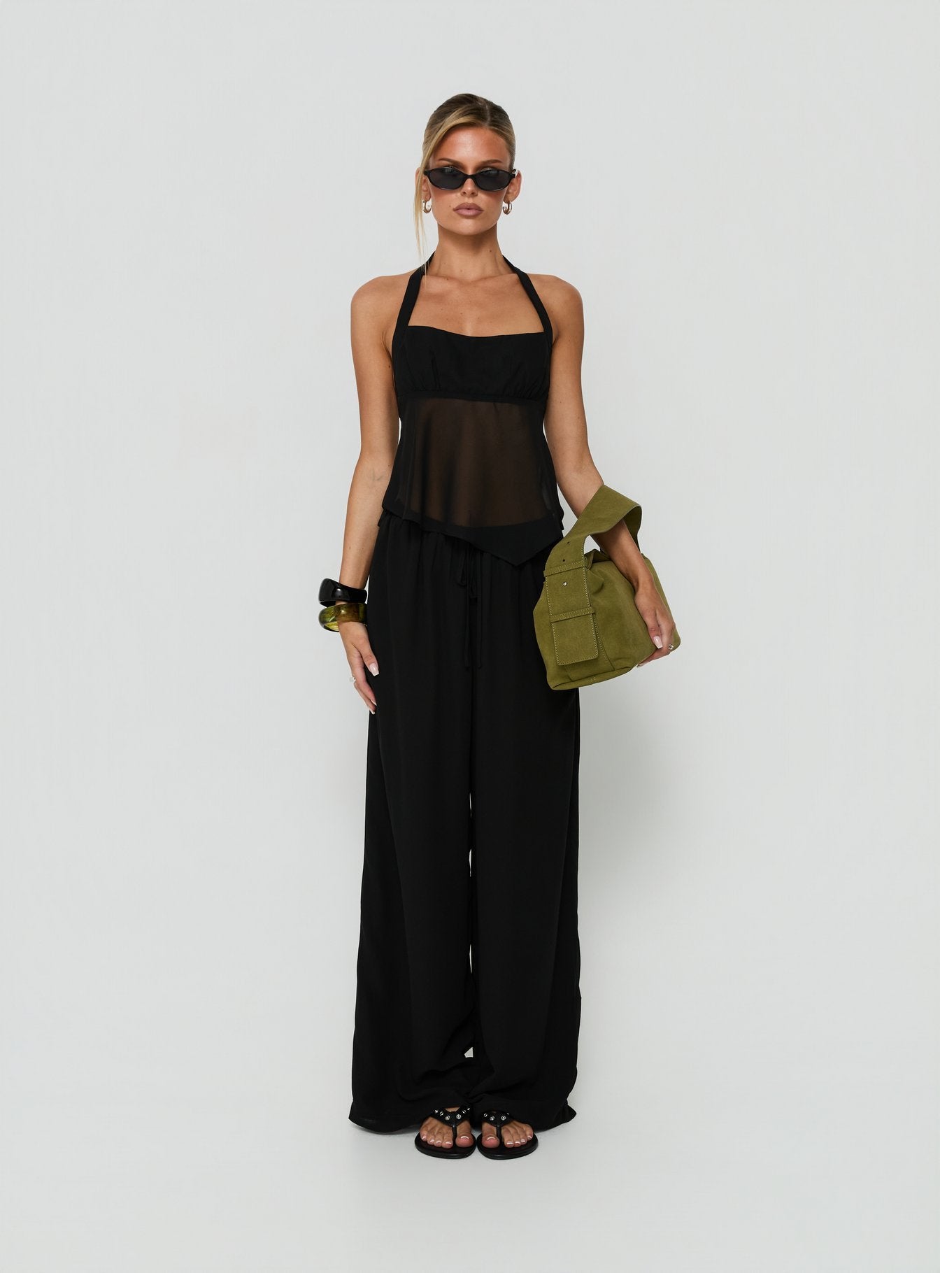 Explore the Finesse Pants Black in womens-regular-pants with mid-rise wide-leg style on-body view of model wearing Princess Polly
