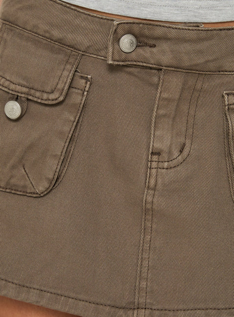 Highlighting the Tarza Cargo Mini Skirt Khaki womens-skirts in mini length with fitted construction product