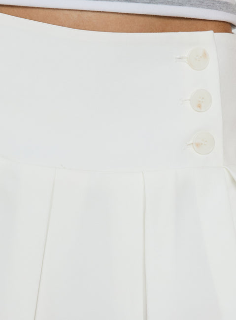 Featuring the Raynah Micro Pleated Mini Skort White in womens-skirts with mini length, solid, a-line shape, and fitted design product Princess Polly