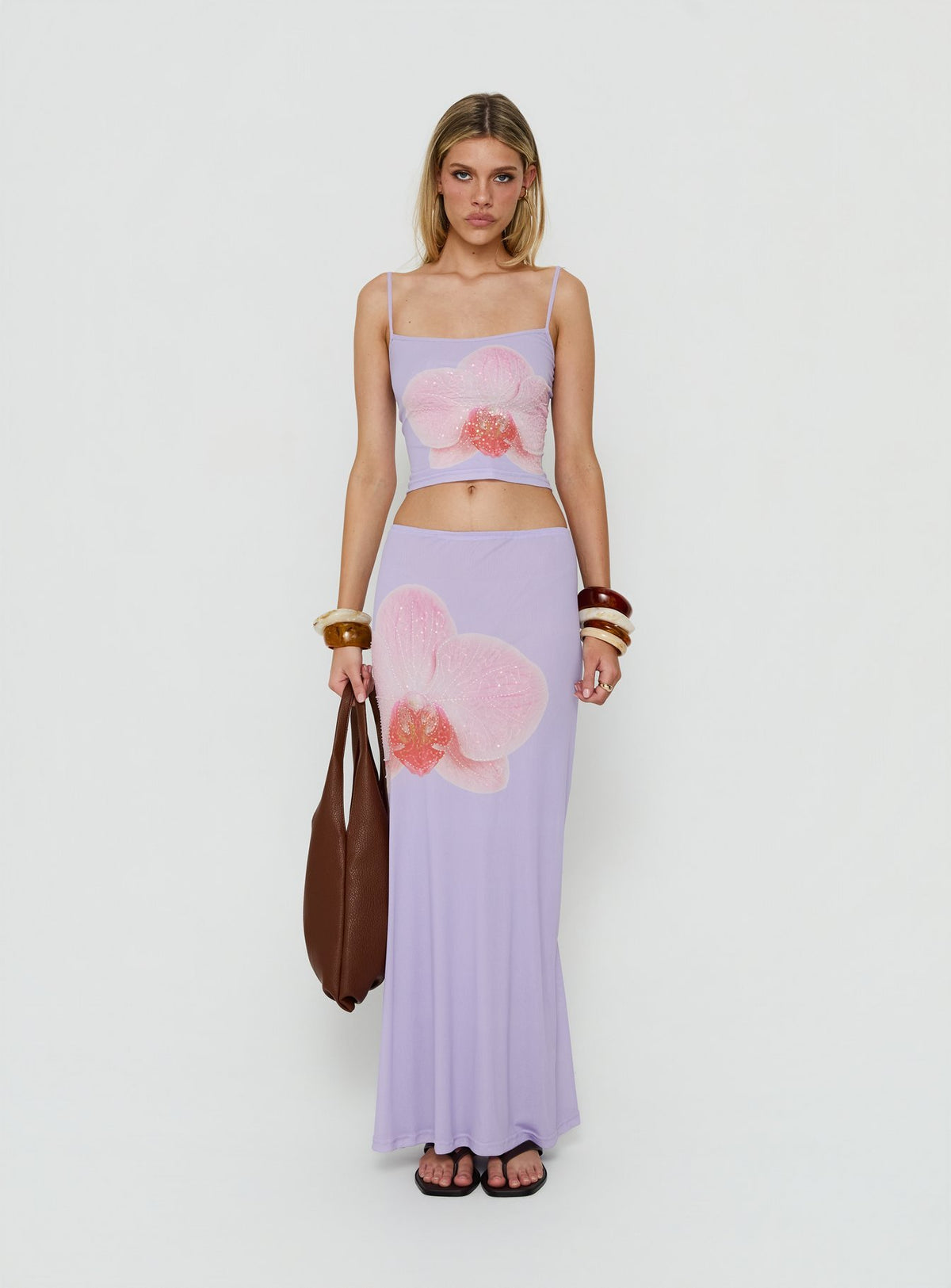 Discover the Golden Visions Maxi Skirt Purple Orchid womens-skirts in maxi length front view of model wearing Princess Polly