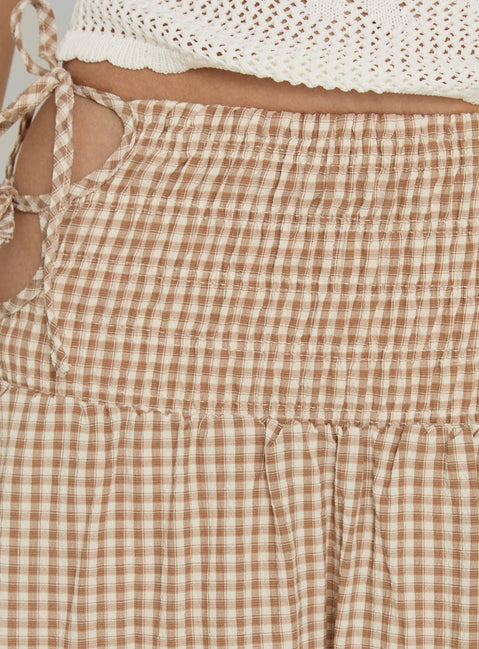 Featuring the Vence Ruched Maxi Skirt Brown Gingham in womens-skirts with checkered print and relaxed a-line shape Princess Polly