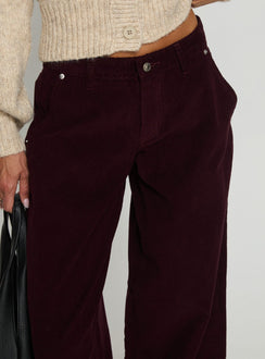back view of model wearing Princess Polly Jacynda Low Waist Wide Leg Corduroy Jeans Currant Mid Rise Jeans 