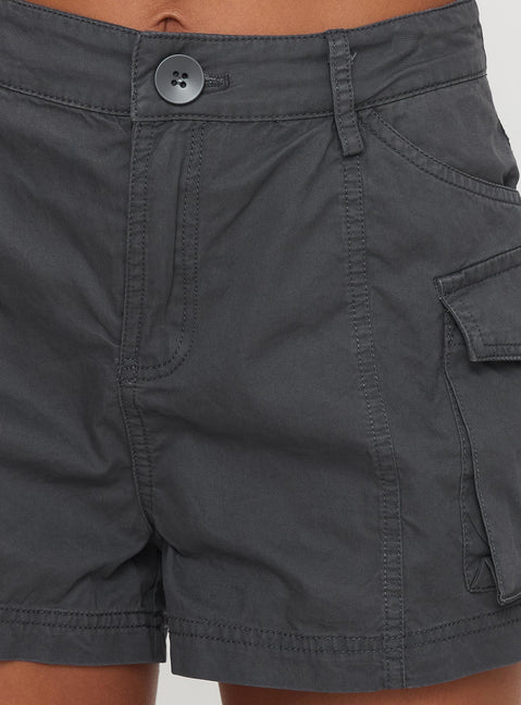 back view of model wearing Princess Polly Colonel Cargo Mini Short Slate Petite 