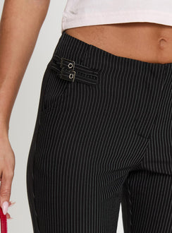 back view of model wearing Princess Polly Sympathiser Pinstripe Pants Black Low Rise Pants 
