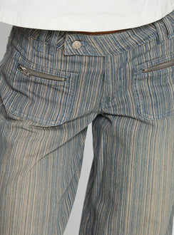 back view of model wearing Princess Polly Lifetimes Mid Rise Wide Leg Cargo Jeans Dark Blue Stripe Mid Rise Jeans 