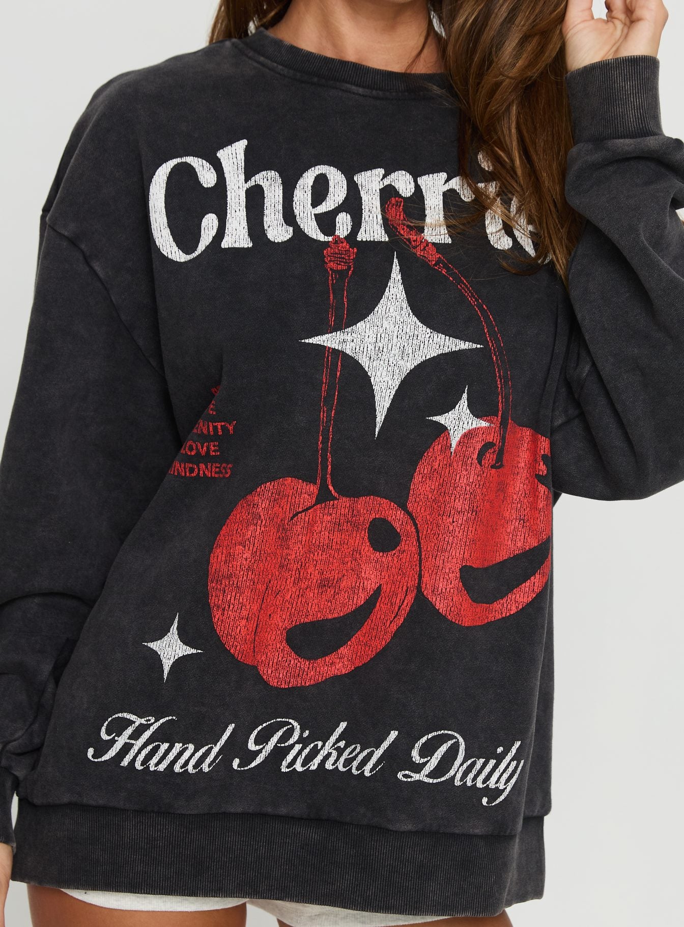 back view of model wearing Princess Polly Hand Picked Graphic Jumper Black 