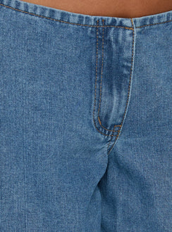 Featuring the Hereos Mid Rise Baggy Leg Jeans in Bright Blue Wash, womens jeans designed with mid-rise waist and belt, product Princess Polly