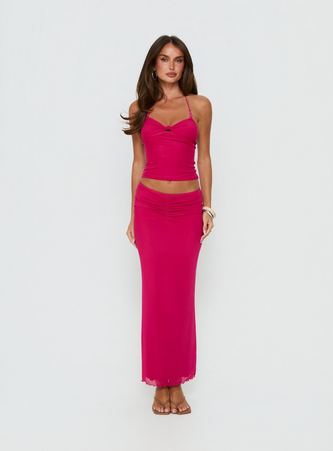   front view of model wearing Princess Polly Jailon Ruched Maxi Skirt Guava Maxi Skirts Skirts 