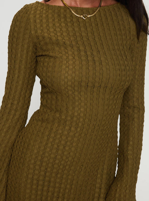 back view of model wearing Princess Polly Lukea Long Sleeve Mini Dress Olive Ribbed Boat Neck 