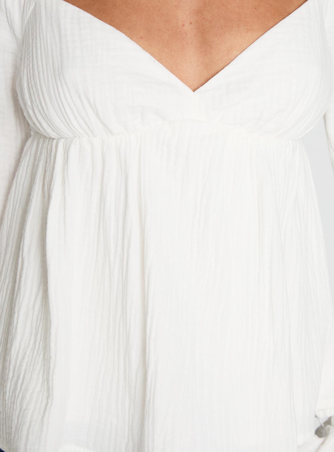 back view of model wearing Princess Polly Khalea Long Sleeve Top White Full Sleeves Sweetheart 